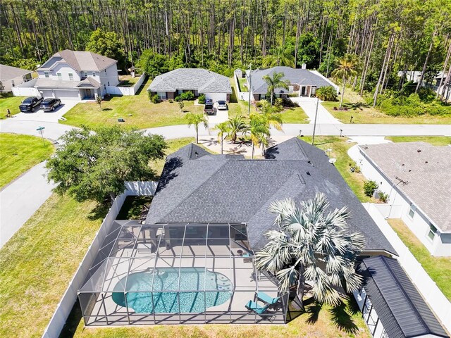 65 Esperanto Dr, Palm Coast, FL 32164 - drone / aerial view with a forest view and a residential view