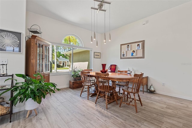 65 Esperanto Dr, Palm Coast, FL 32164 - dining area featuring baseboards and wood finished floors