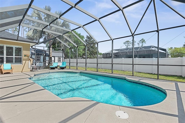 65 Esperanto Dr, Palm Coast, FL 32164 - view of pool featuring a patio area, a fenced backyard, a fenced in pool, and glass enclosure