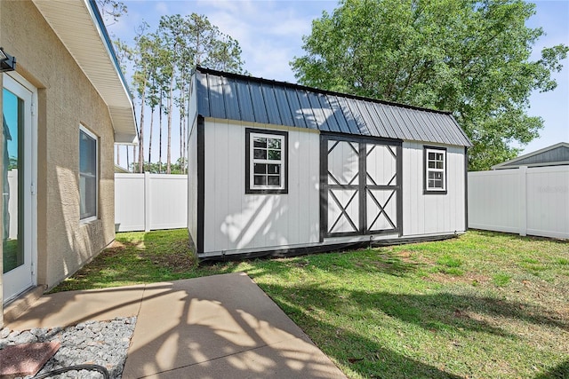 65 Esperanto Dr, Palm Coast, FL 32164 - view of shed featuring a fenced backyard