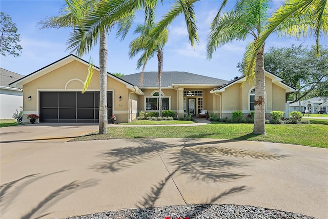 65 Esperanto Dr, Palm Coast, FL 32164 - ranch-style home with stucco siding, an attached garage, concrete driveway, and a front lawn