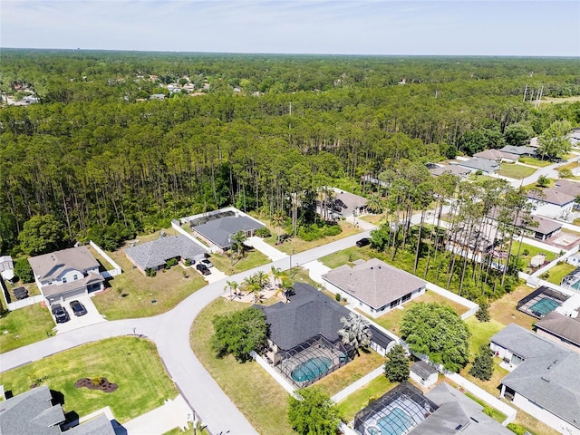 65 Esperanto Dr, Palm Coast, FL 32164 - bird's eye view with a residential view and a wooded view