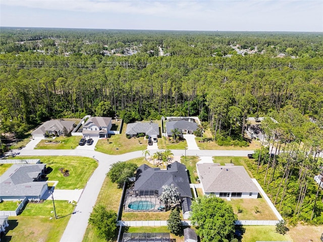65 Esperanto Dr, Palm Coast, FL 32164 - drone / aerial view featuring a residential view and a wooded view