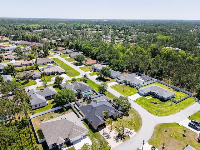 65 Esperanto Dr, Palm Coast, FL 32164 - drone / aerial view featuring a wooded view and a residential view
