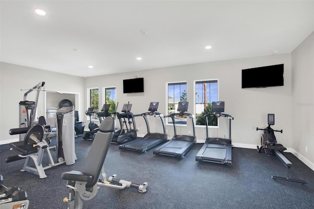 gym with recessed lighting and baseboards