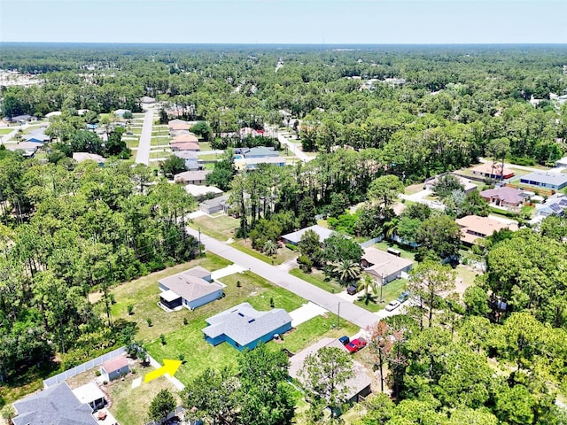 55 Ryan Dr, Palm Coast, FL 32164 - aerial view of residential area featuring a forest