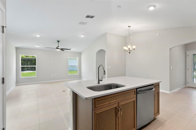 55 Ryan Dr, Palm Coast, FL 32164 - kitchen featuring a sink, dishwasher, light tile patterned flooring, baseboards, and light countertops