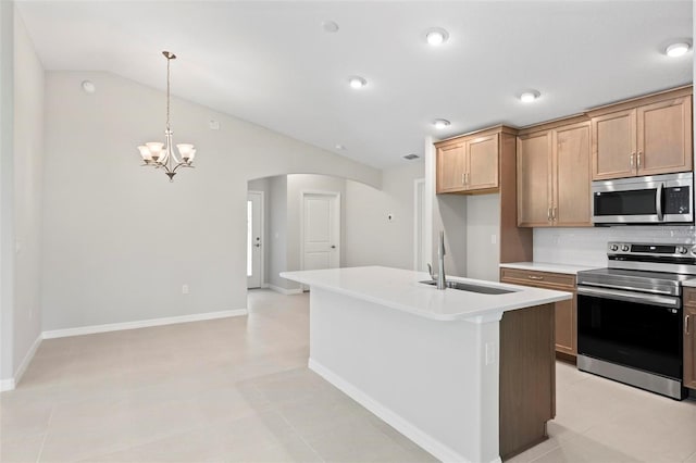 55 Ryan Dr, Palm Coast, FL 32164 - kitchen with stainless steel appliances, a sink, arched walkways, a chandelier, and decorative backsplash
