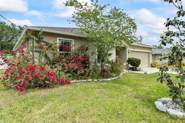 47 Raleigh Dr, Palm Coast, FL 32164 - view of front facade with stucco siding, a front yard, and an attached garage
