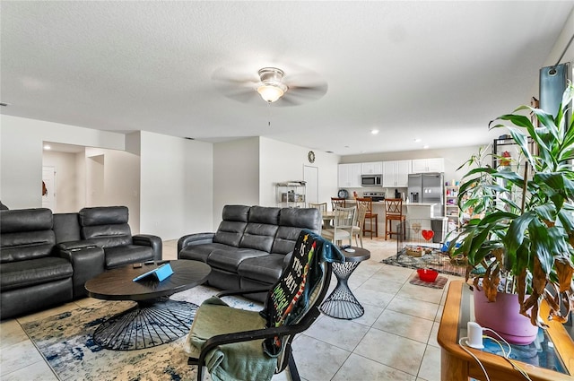 47 Raleigh Dr, Palm Coast, FL 32164 - living area with light tile patterned flooring and a ceiling fan