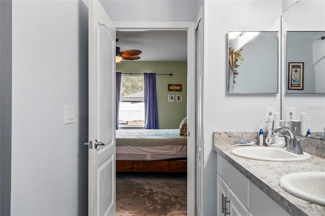 47 Raleigh Dr, Palm Coast, FL 32164 - full bath featuring double vanity, ensuite bathroom, concrete flooring, and a sink