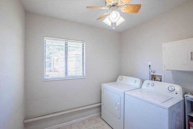 laundry area with light tile patterned flooring, laundry area, a ceiling fan, and washer and clothes dryer