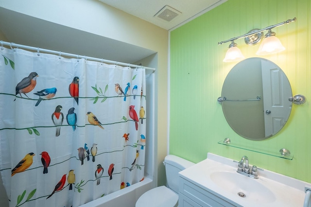 bathroom with visible vents, shower / tub combo, toilet, and vanity