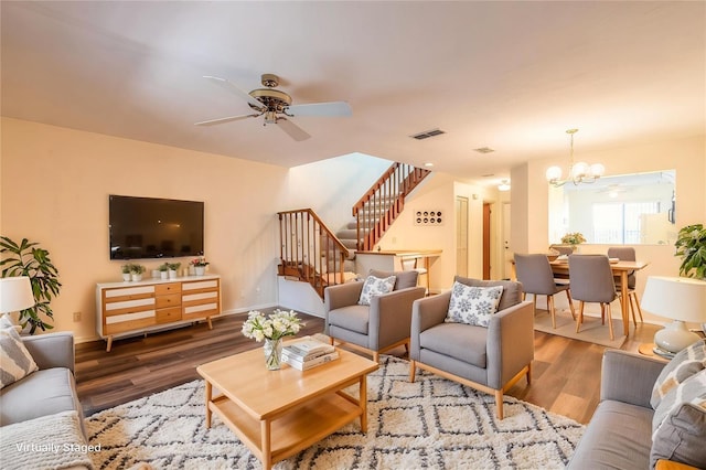 140 Limewood Pl Unit 2, Ormond Beach, FL 32174 - living area with stairs, a chandelier, wood finished floors, and ceiling fan