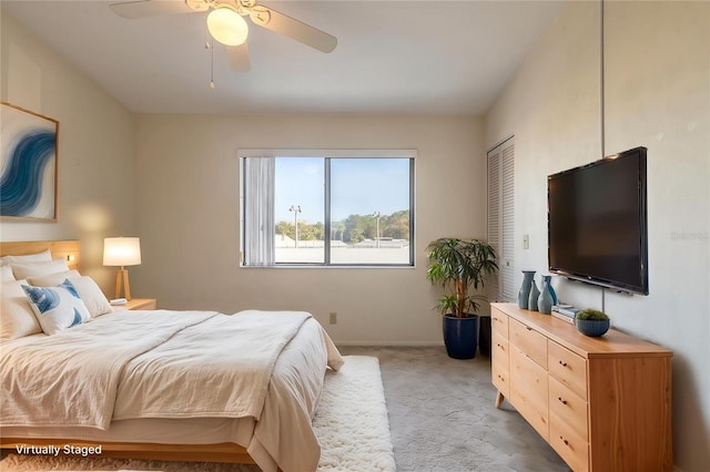 140 Limewood Pl Unit 2, Ormond Beach, FL 32174 - bedroom with light carpet, baseboards, and ceiling fan