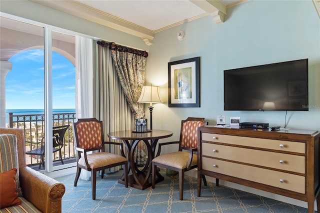 200 Ocean Crest Dr Unit 726, Palm Coast, FL 32137 - living area with ornamental molding, carpet floors, decorative columns, and a water view