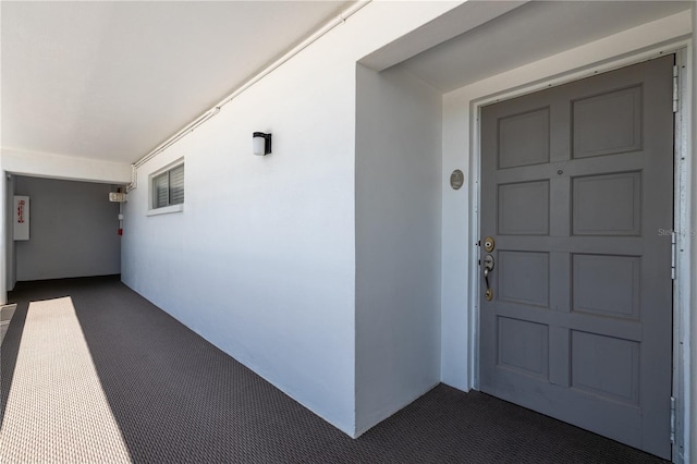 1155 Ocean Shore Blvd Unit 702, Ormond Beach, FL 32176 - property entrance with stucco siding