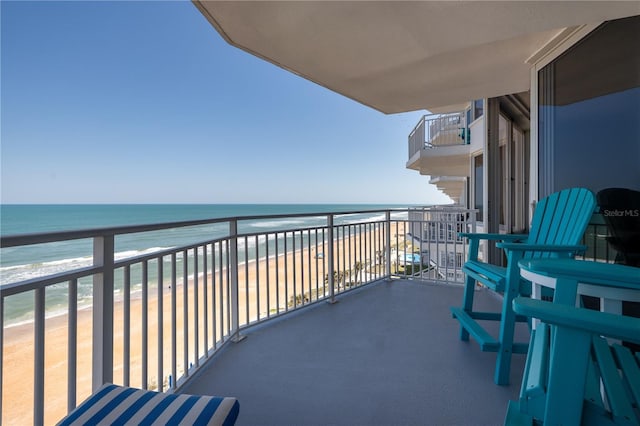 1155 Ocean Shore Blvd Unit 702, Ormond Beach, FL 32176 - balcony featuring a beach view and a water view
