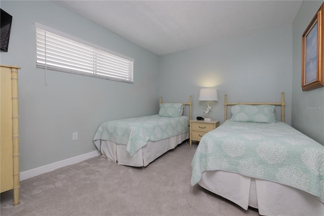 1155 Ocean Shore Blvd Unit 702, Ormond Beach, FL 32176 - carpeted bedroom featuring baseboards
