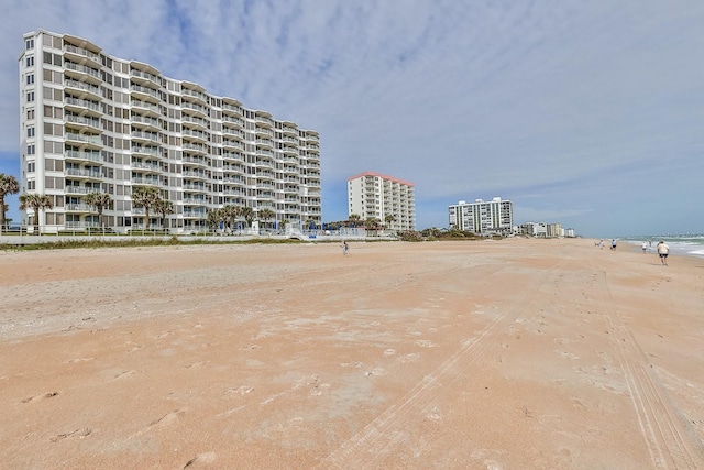 1155 Ocean Shore Blvd Unit 702, Ormond Beach, FL 32176 - surrounding community with a view of the beach and a water view