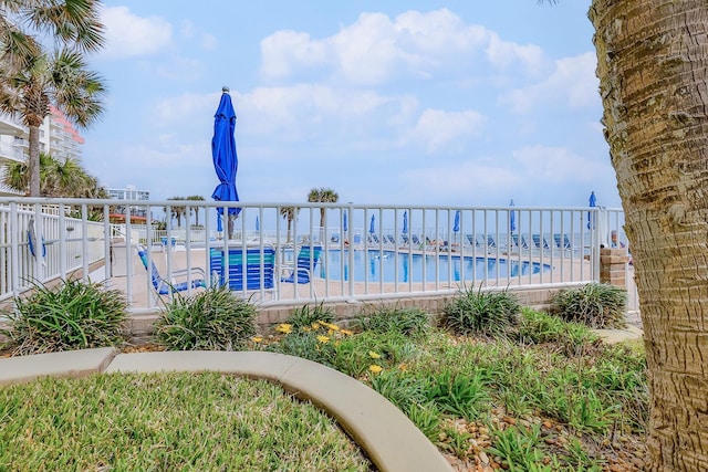 1155 Ocean Shore Blvd Unit 702, Ormond Beach, FL 32176 - community pool with fence