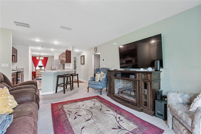 64 Princess Ruth Ln, Palm Coast, FL 32164 - living area featuring recessed lighting, visible vents, baseboards, and light carpet