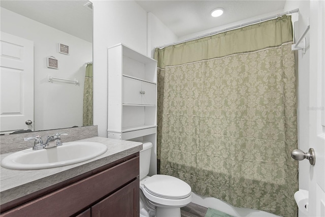 64 Princess Ruth Ln, Palm Coast, FL 32164 - bathroom featuring shower / bath combination with curtain, toilet, and vanity