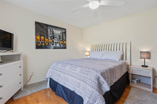 9 Pittman Dr, Palm Coast, FL 32164 - bedroom with baseboards, a ceiling fan, and wood finished floors