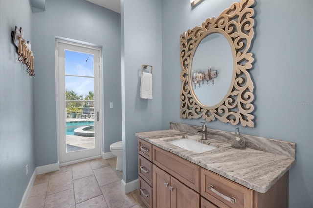 2590 Palm Ave, Flagler Beach, FL 32136 - bathroom with vanity and baseboards