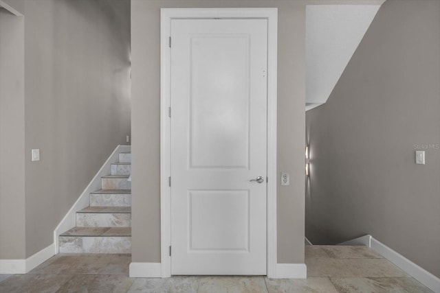2590 Palm Ave, Flagler Beach, FL 32136 - stairway featuring baseboards