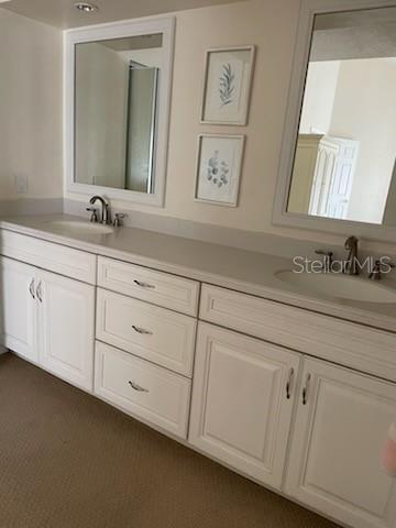 5 Nantucket Dr, Palm Coast, FL 32137 - full bath featuring a sink and double vanity