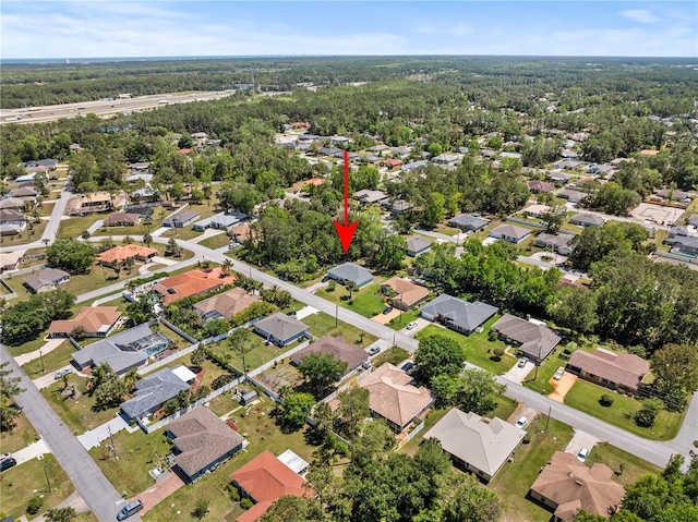 drone / aerial view with a residential view