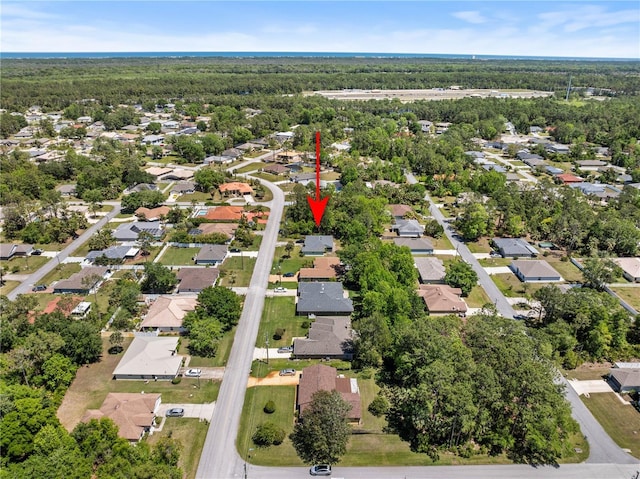 aerial view with a view of trees and a residential view