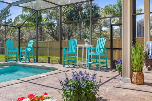 28 Cinnamon Grove Ln, Palm Coast, FL 32137 - view of swimming pool featuring fence, outdoor dry bar, a patio, a fenced in pool, and a lanai