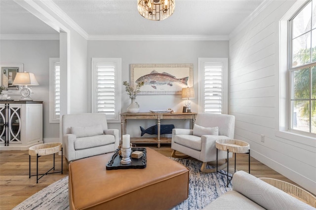 28 Cinnamon Grove Ln, Palm Coast, FL 32137 - living area featuring crown molding, wood walls, wood finished floors, and a chandelier