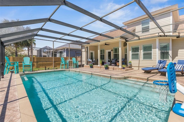 28 Cinnamon Grove Ln, Palm Coast, FL 32137 - view of swimming pool with fence, ceiling fan, a fenced in pool, a patio, and glass enclosure