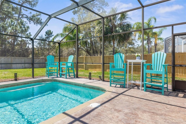 28 Cinnamon Grove Ln, Palm Coast, FL 32137 - view of swimming pool featuring a fenced backyard, a fenced in pool, a patio, and a lanai