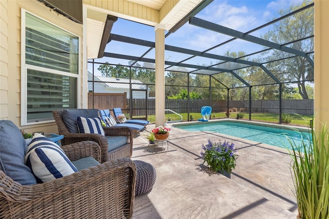 28 Cinnamon Grove Ln, Palm Coast, FL 32137 - view of swimming pool with a lanai, a patio area, a fenced in pool, a fenced backyard, and outdoor lounge area