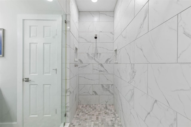 28 Cinnamon Grove Ln, Palm Coast, FL 32137 - bathroom featuring tiled shower