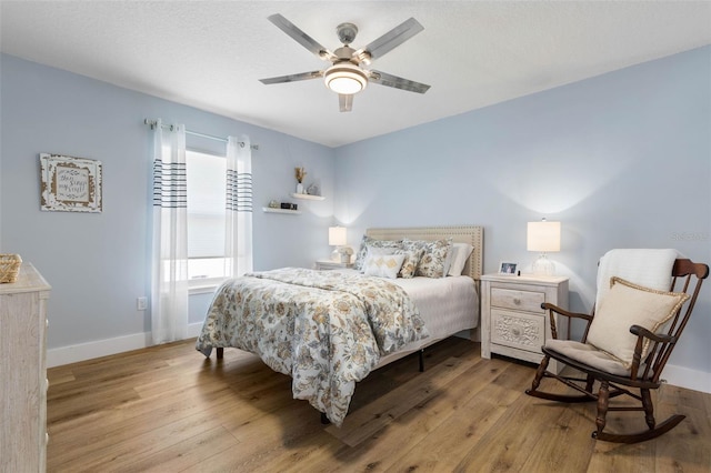 28 Cinnamon Grove Ln, Palm Coast, FL 32137 - bedroom featuring baseboards, ceiling fan, and wood finished floors