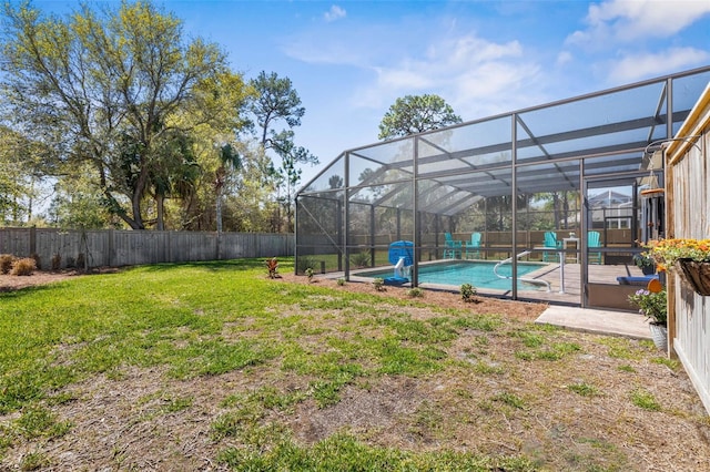 28 Cinnamon Grove Ln, Palm Coast, FL 32137 - view of yard with a fenced in pool, a lanai, and a fenced backyard