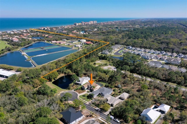 28 Cinnamon Grove Ln, Palm Coast, FL 32137 - birds eye view of property with a water view and a residential view