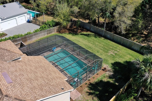 28 Cinnamon Grove Ln, Palm Coast, FL 32137 - view of swimming pool featuring a lawn, a fenced in pool, and a fenced backyard