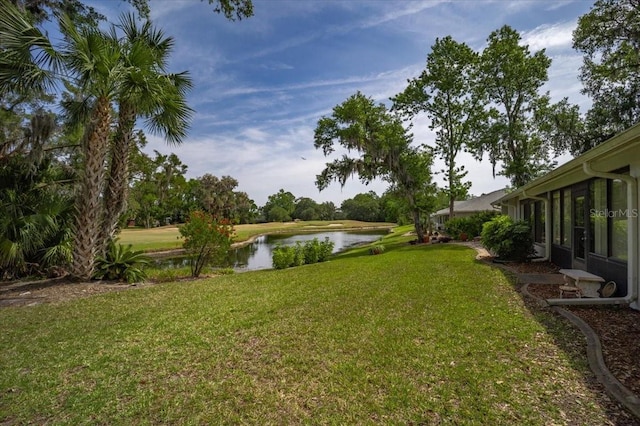 view of yard with a water view