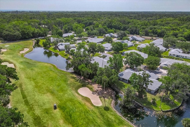 birds eye view of property with a wooded view, a water view, a residential view, and golf course view