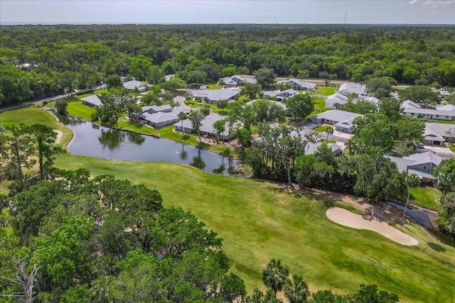 birds eye view of property featuring a residential view, a water view, golf course view, and a view of trees