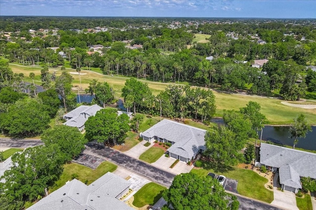bird's eye view featuring golf course view, a residential view, and a water view