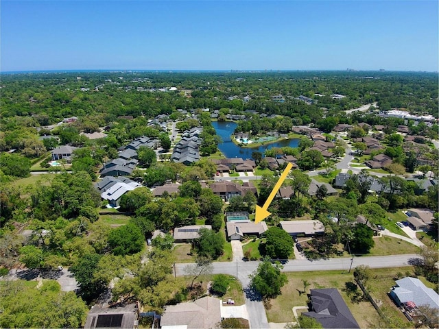 bird's eye view with a water view and a residential view