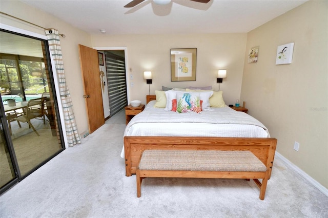 bedroom featuring light colored carpet, ceiling fan, and access to exterior