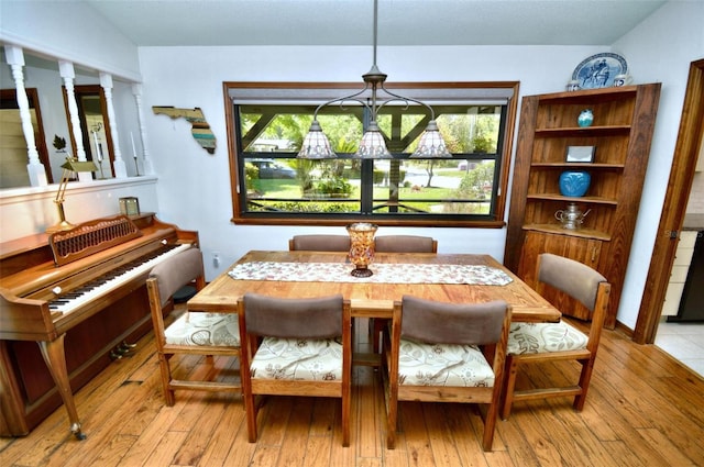 dining area with hardwood / wood-style flooring